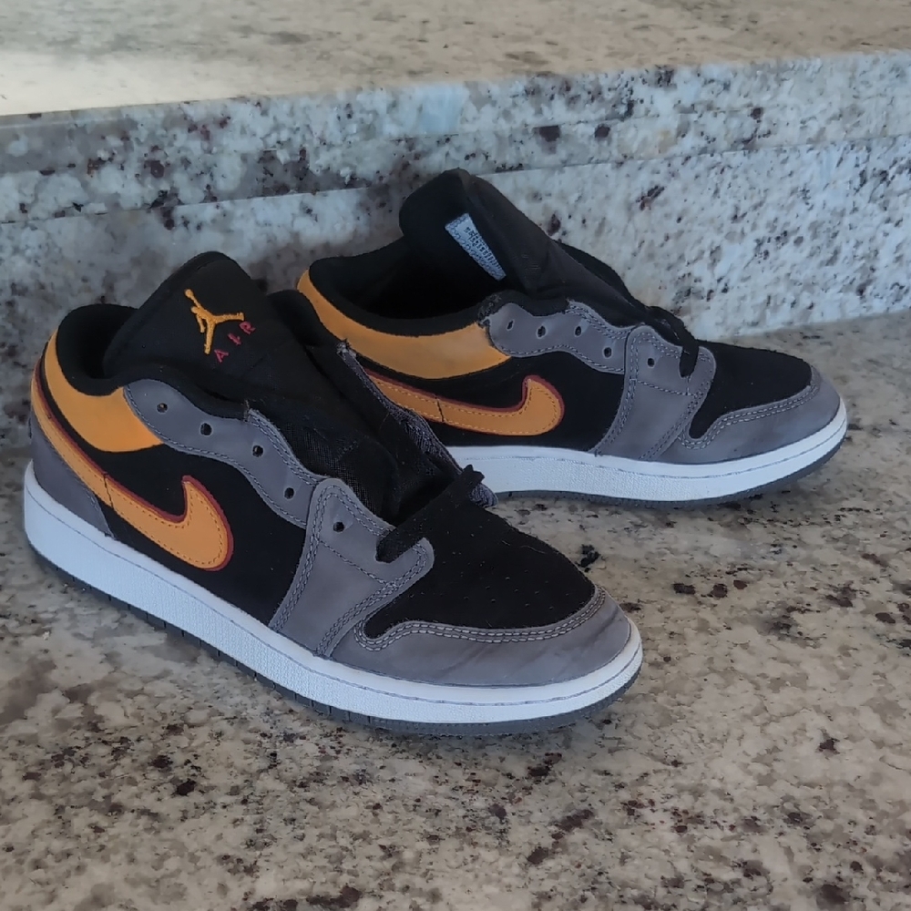 Black and Orange Sneakers with Gray Accents